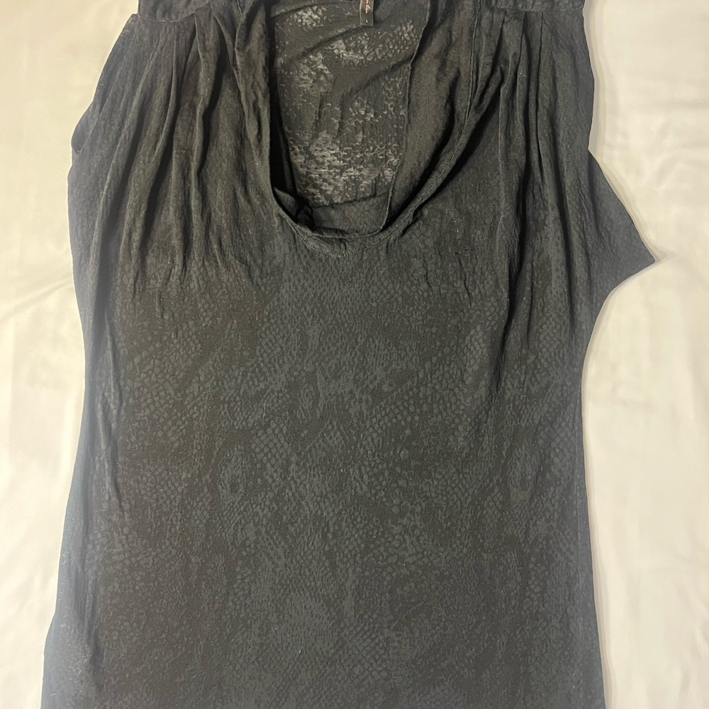 BCBGMaxAzria black semi see-through top. Size Large. Black. Good condition.
